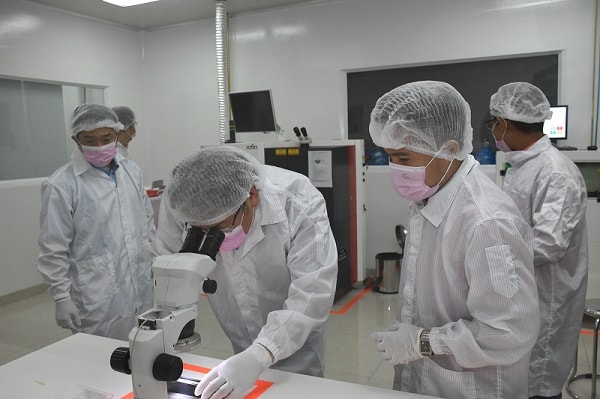 Dr. Ikeno examining coronary stent samples